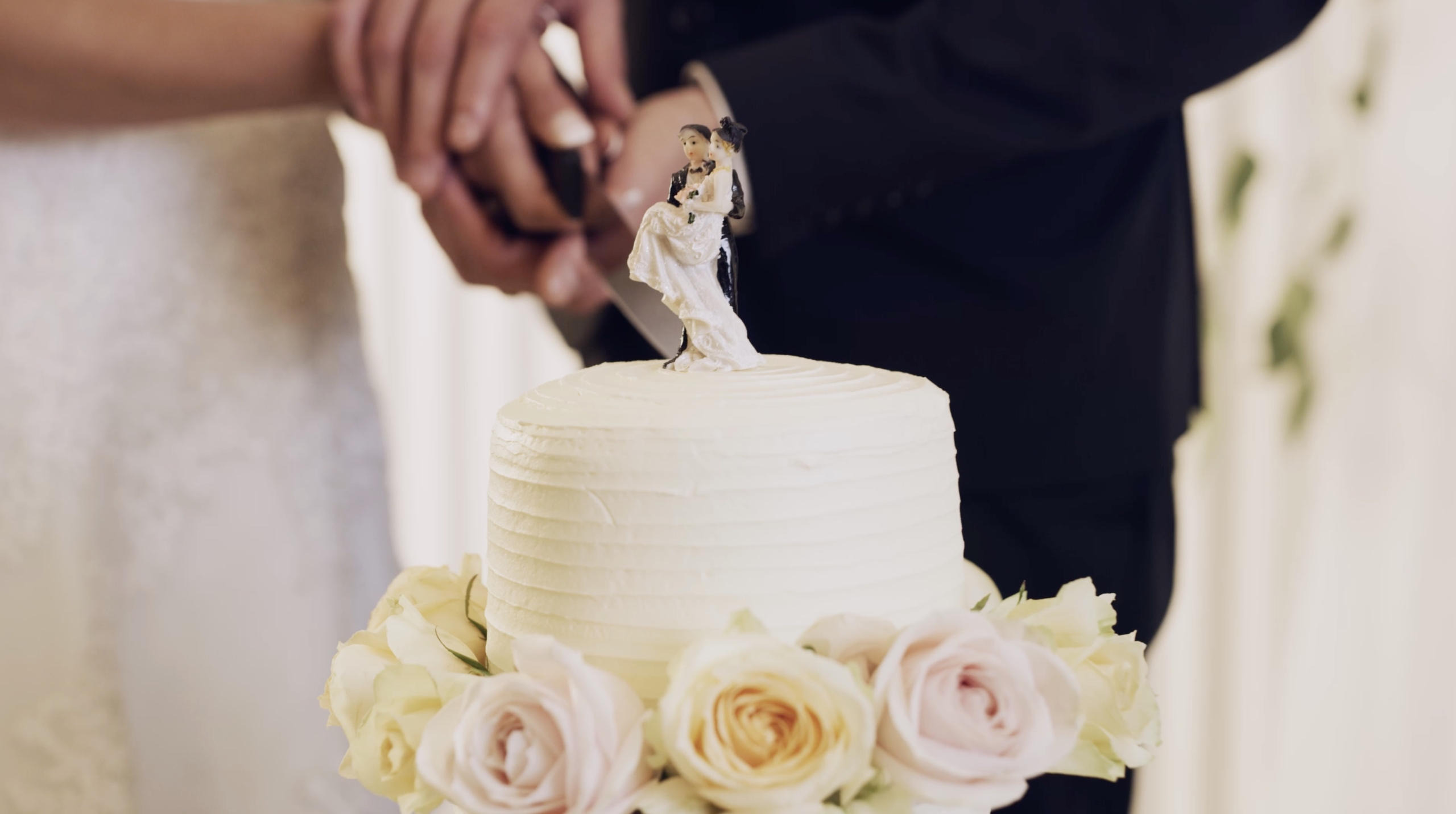 The traditional cutting of the cake.